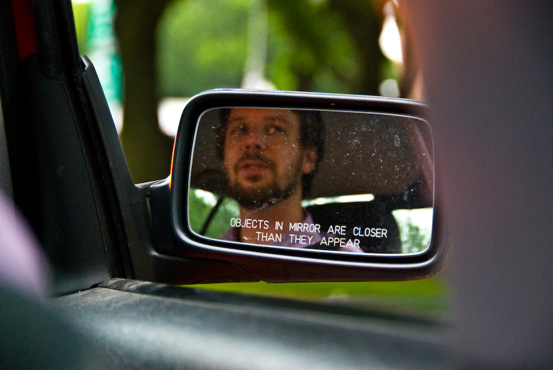 objects in the mirror are bearded